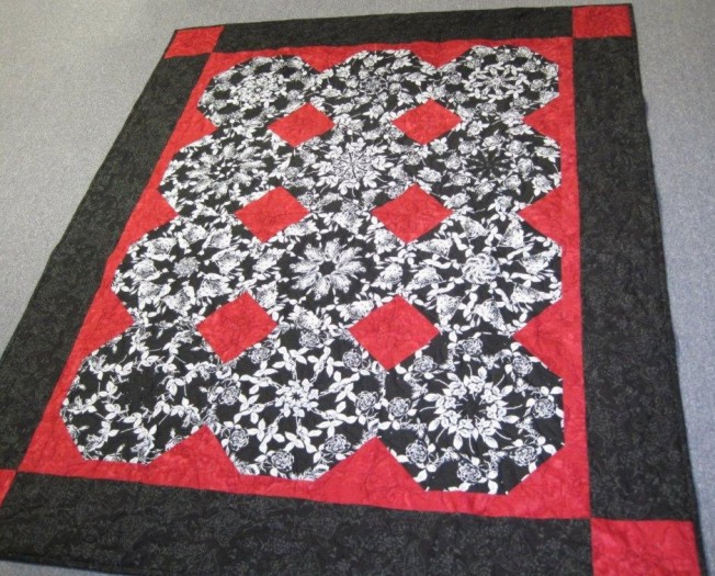 red, black, and white Stack and Whack quilt