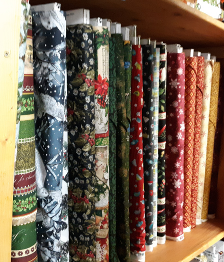 Christmas fabrics shelf 3a